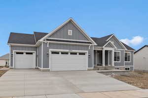 View of front facade featuring a garage