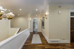 Upstairs hallway w/antique lighting fixtures & chndelier