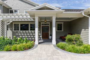 Side entry covered porch w/custom wide door