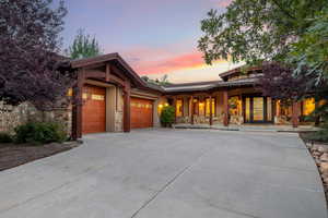 Prairie-style house featuring a garage