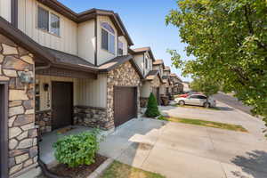 View of side of property featuring a garage