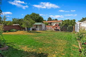 View of yard featuring an outdoor structure