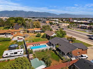 Birds eye view of property featuring a mountain view