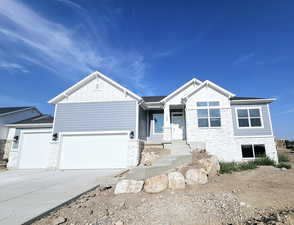 View of front of house with a garage