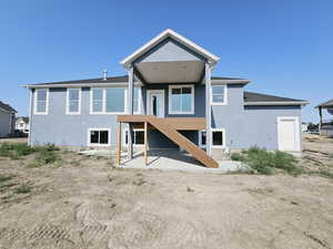 Back of property featuring a patio