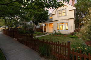 View of front of property with a lawn