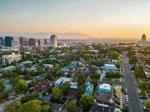 Aerial view at dusk featuring a mountain view