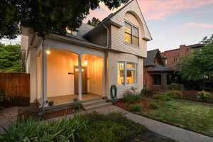 View of front of home with a yard