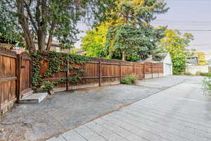 View of patio / terrace with an outbuilding and a garage