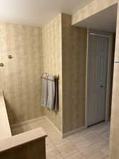 Bathroom featuring a textured ceiling