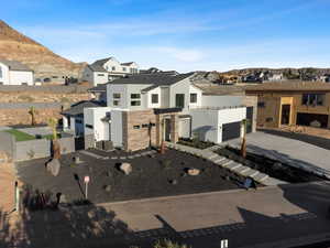 View of front of home featuring a mountain view