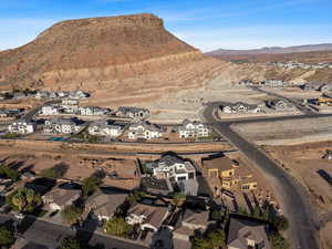 Birds eye view of property with a mountain view