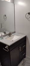 Bathroom featuring vanity and tile patterned flooring