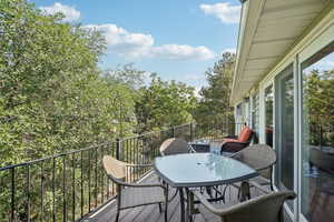 Back deck upstairs off of living room and kitchen