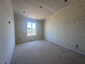 Spare room with a textured ceiling