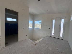 Entryway with a textured ceiling