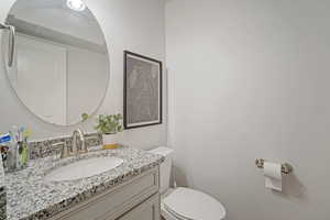 Bathroom with vanity and toilet