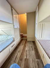 Unfurnished bedroom featuring light hardwood / wood-style flooring