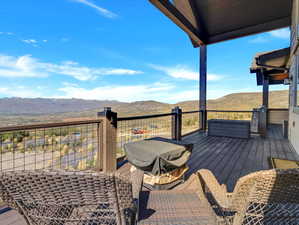 Deck featuring a mountain view