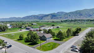 Birds eye view of property with a mountain view