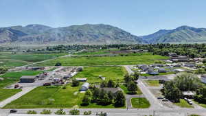 Birds eye view of property with a mountain view