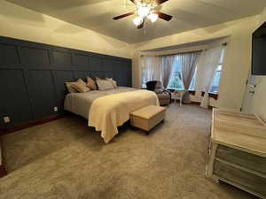 Bedroom with light carpet and ceiling fan