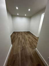 Unfurnished room with hardwood / wood-style floors