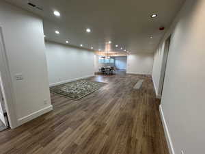 Unfurnished living room with wood-type flooring