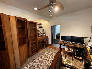 Office area with ceiling fan and light hardwood / wood-style floors