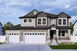 View of front of property featuring board and batten siding, covered porch, driveway, and fence