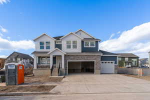 View of front of home featuring a garage