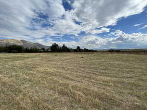 View of local wilderness featuring a mountain view and a rural view