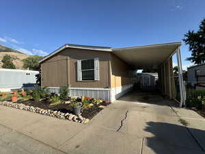 Exterior space with a carport