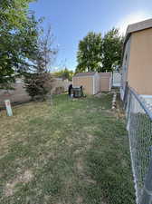 View of yard with a shed