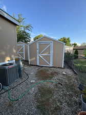 View of outdoor structure with cooling unit