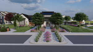View of front of property with a front yard