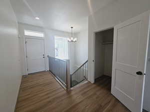 Interior space featuring a chandelier and hardwood / wood-style flooring