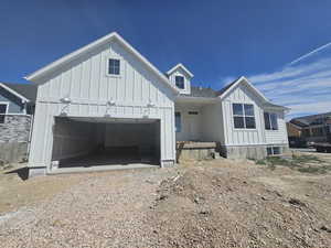 View of front of home featuring a garage