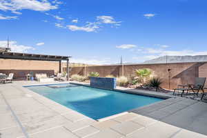 View of pool featuring a pergola, a patio area, and a mountain view