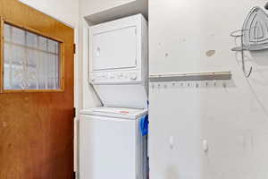 Laundry area with stacked washer / drying machine