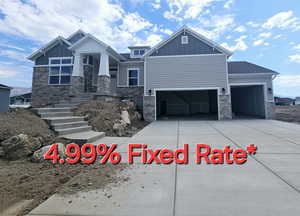 Craftsman-style house featuring a garage