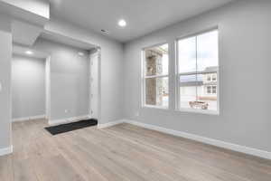 Spare room featuring light hardwood / wood-style floors