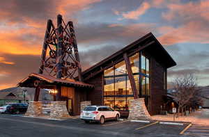 Outdoor building at dusk featuring central AC