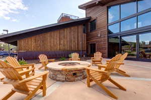 View of patio / terrace featuring an outdoor fire pit