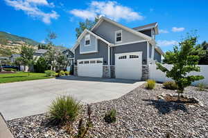 Craftsman-style home featuring a garage