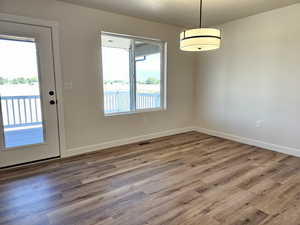 Interior space featuring wood-type flooring and a wealth of natural light