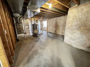 Basement featuring gas water heater