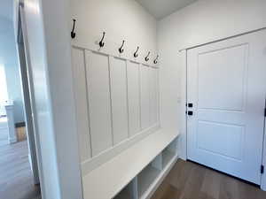 Mudroom featuring dark hardwood / wood-style floors