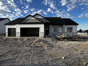 View of front of property with a garage