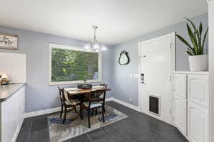 Dining space with a notable chandelier